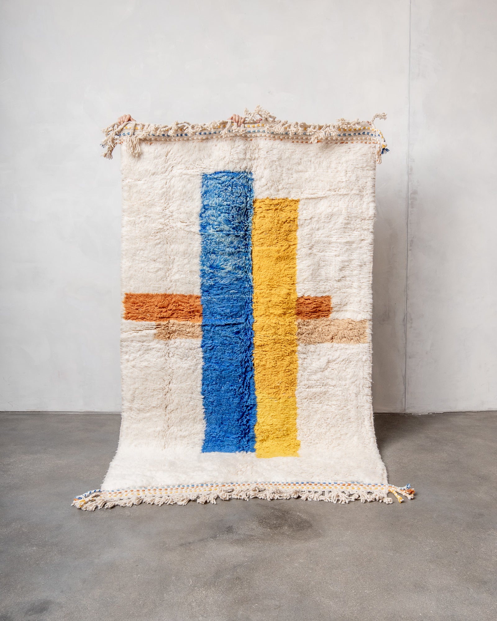 Modern, designer, handcrafted Berber rug from Morocco. Beniourain carpet with beautiful colours and patterns and fluffy wool texture.